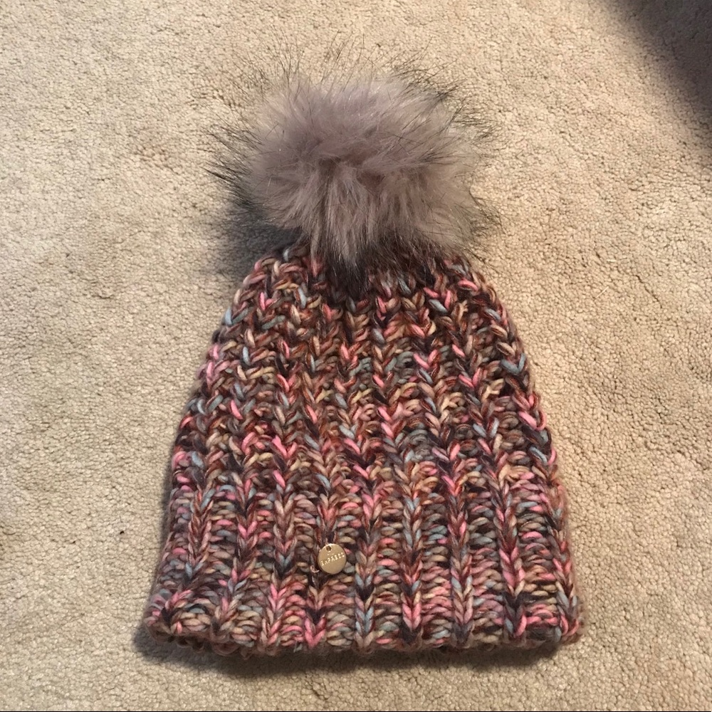 Women’s winter hat with ball on top